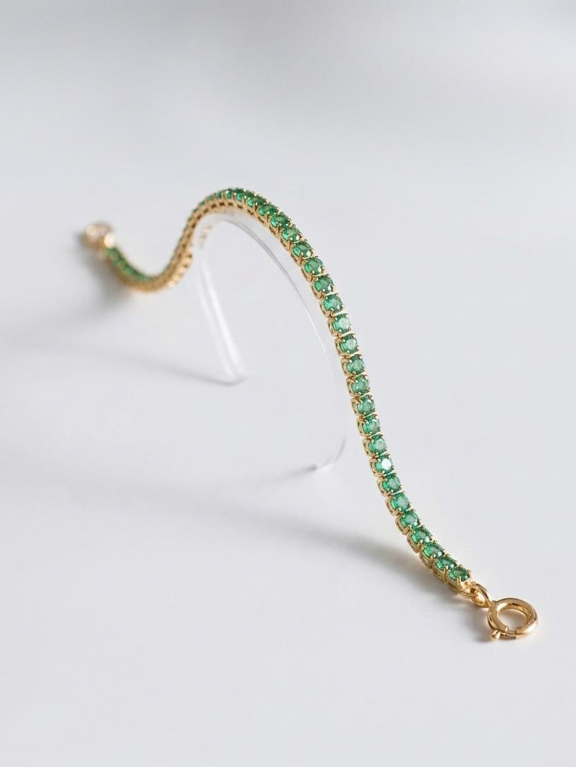 Pulsera Tennis en oro laminado con esmeraldas naturales